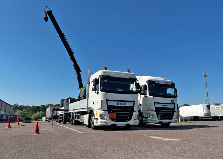 Camion poid lourds avec bras de levage HEINTZ transports